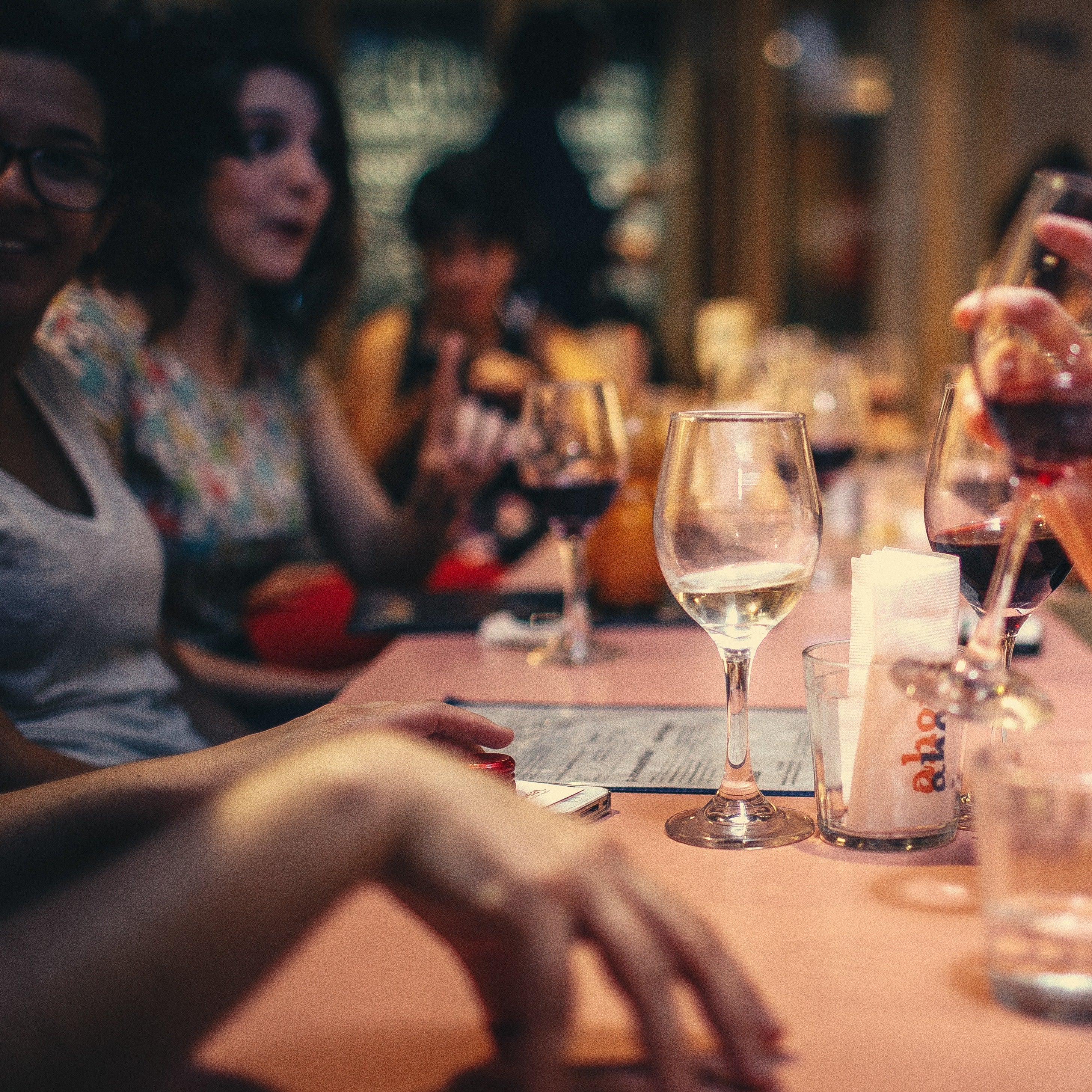 Guests laughing and enjoying themselves at a cocktail party