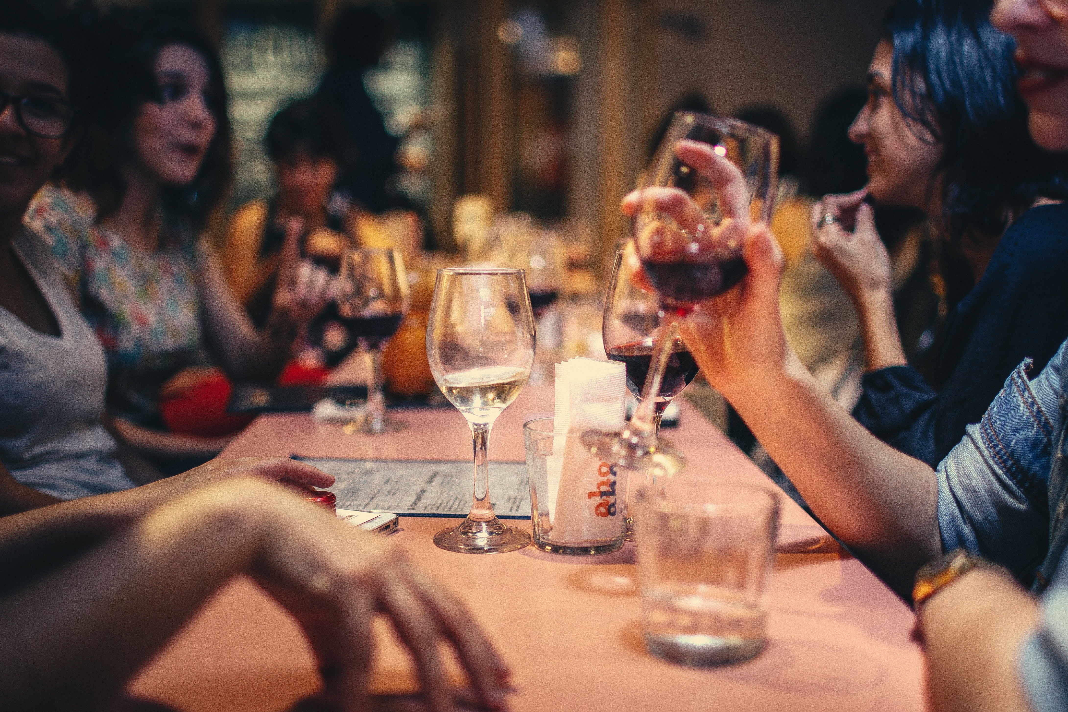 Guests laughing and enjoying themselves at a cocktail party